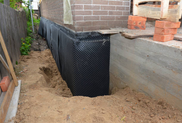 Happy homeowners after waterproofing job in Waterford Works